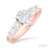 1 1/10 ctw Pear Shape Round Cut Diamond Semi Mount Engagement Ring in 14K Rose and White Gold