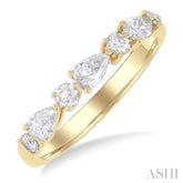 5/8 ctw Pear and Round Cut Diamond Fashion Band in 14K Yellow Gold