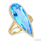 26x9 MM Pear Shape Blue Topaz and 1/3 ctw Round Cut Diamond Halo Semi Precious Ring in 14K Yellow Gold