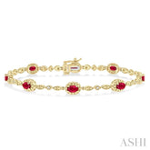 5x3 MM Oval Cut Ruby and 1/20 ctw Single Cut Diamond Bracelet in 10K Yellow Gold