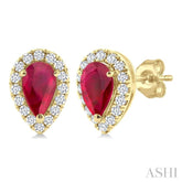 5x3 MM Pear Shape Ruby and 1/8 Ctw Round Cut Diamond Halo Precious Stud Earrings in 10K Yellow Gold