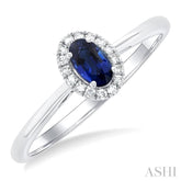 5x3 MM Oval Shape Sapphire and 1/20 Ctw Round Cut Diamond Halo Precious Ring in 10K White Gold