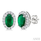 5x3 MM Oval Shape Emerald and 1/8 Ctw Round Cut Diamond Halo Precious Stud Earrings in 14K White Gold