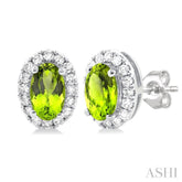 5x3 MM Oval Shape Peridot and 1/8 Ctw Round Cut Diamond Halo Semi-Precious Stud Earrings in 14K White Gold