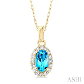 5x3 MM Oval Shape Blue Topaz and 1/20 Ctw Round Cut Diamond Halo Semi-Precious Pendant with Chain in 10K Yellow Gold
