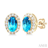 5x3 MM Oval Shape Blue Topaz and 1/8 Ctw Round Cut Diamond Halo Semi-Precious Stud Earrings in 10K Yellow Gold