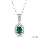 6x4 MM Oval Cut Emerald and 1/8 ctw Round Cut Diamond Pendant in 14K White Gold with Chain