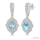 5x3 MM Oval Shape Aquamarine and 1/4 ctw Round Cut Diamond Semi Precious Earrings in 10K White Gold