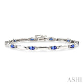 5x3 MM Oval Cut Tanzanite and 1/10 ctw Bar and Oval Mount Round Cut Diamond Precious Bracelet in 10K White Gold