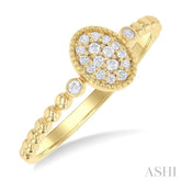 1/8 ctw Petite Bead Shank Oval Center Round Cut Diamond Fashion Ring in 10K Yellow Gold