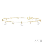 3 MM Round Shape Cultured Pearl and 1/20 ctw Round Cut Diamond Station Bracelet in 14K Yellow Gold