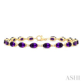 6X4 MM Oval Cut Amethyst and 1/6 ctw Round Cut Diamond Semi Precious Tennis Bracelet in 10K Yellow Gold
