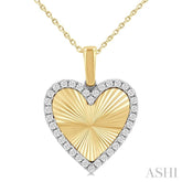 1/4 ctw Fluted Texture Heart Round Cut Diamond Fashion Pendant With Chain in 10K Yellow and White Gold