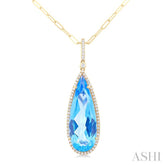26x9 MM Pear Cut Blue Topaz and 1/4 ctw Round Cut Diamond Halo Semi Precious Pendant With Chain in 14K Yellow Gold