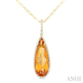 26x9 MM Pear Cut Citrine and 1/4 ctw Round Cut Diamond Halo Semi Precious Pendant With Chain in 14K Yellow Gold