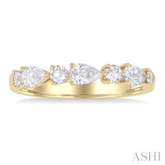 5/8 ctw Pear and Round Cut Diamond Fashion Band in 14K Yellow Gold