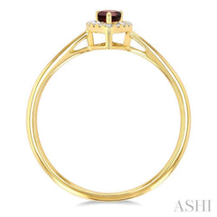 5x3 MM Pear Shape Garnet and 1/20 ctw Single Cut Diamond Halo Semi Precious Ring in 10K Yellow Gold