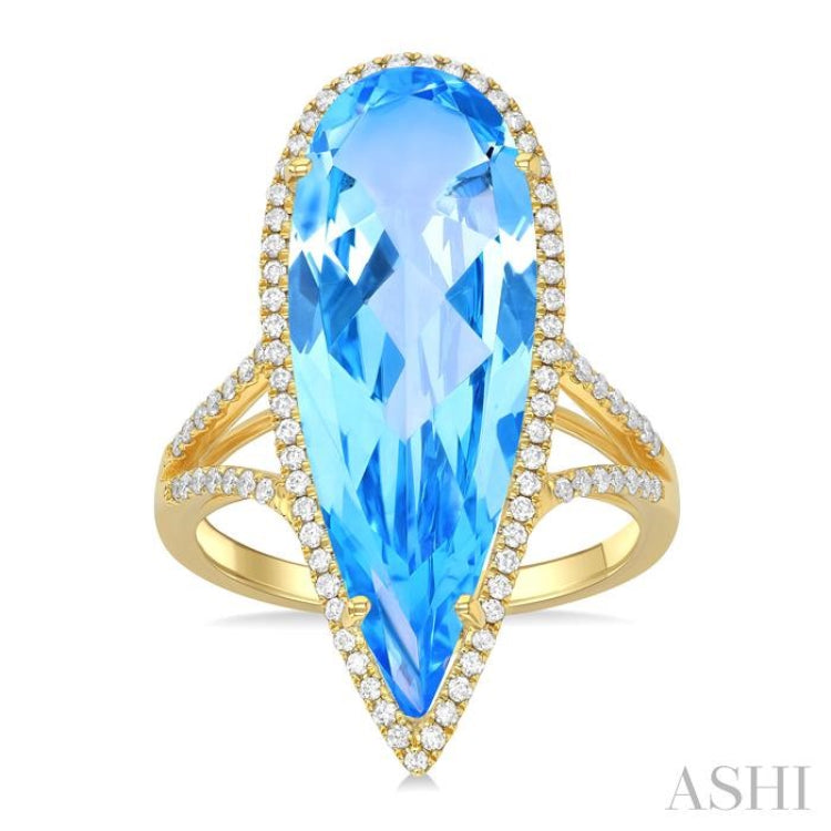 26x9 MM Pear Shape Blue Topaz and 1/3 ctw Round Cut Diamond Halo Semi Precious Ring in 14K Yellow Gold