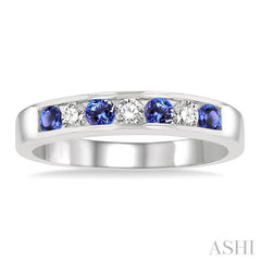 2.5 MM Round Cut Tanzanite and 1/5 Ctw Channel Set Round Cut Diamond Band in 14K White Gold