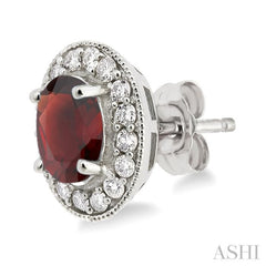 7x5 MM Oval Cut Garnet and 3/8 Ctw Round Cut Diamond Earrings in 14K White Gold