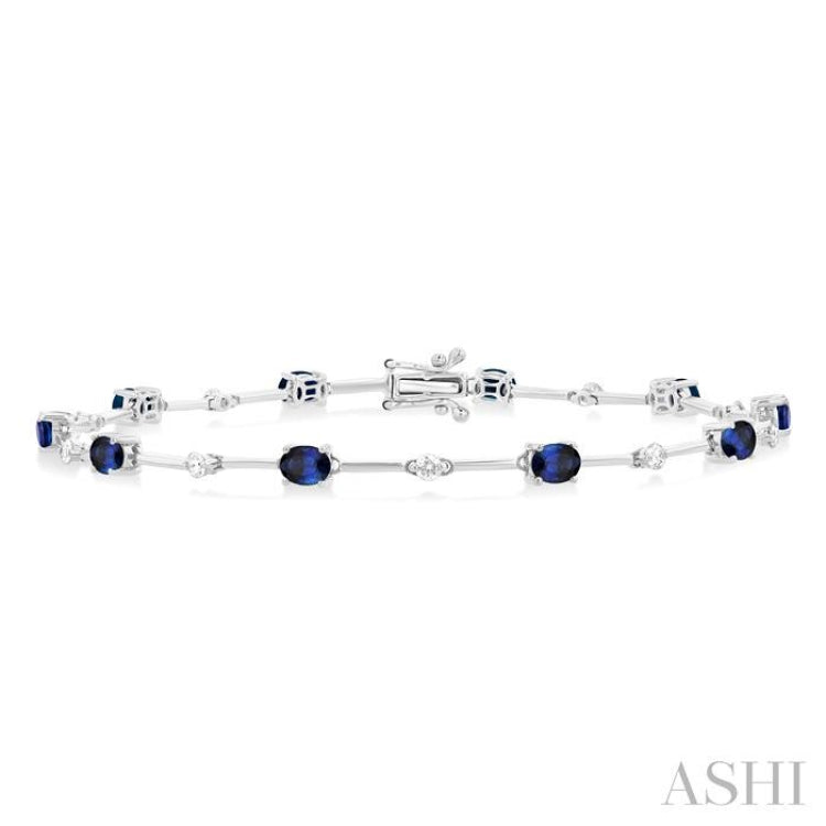 4x3 MM Oval Cut Sapphire and 1/3 Ctw Round Cut Diamond Precious Bar Bracelet in 10K White Gold