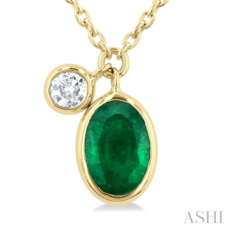6x4 MM Oval Cut Emerald and 1/20 Ctw Bezel Set Round Cut Diamond Precious Pendant With Chain in 14K Yellow Gold