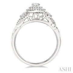 5/8 Ctw Split Twisted Shank Round Cut Diamond Engagement Ring With 1/4 Ct Pear Cut Center Stone in 14K White Gold