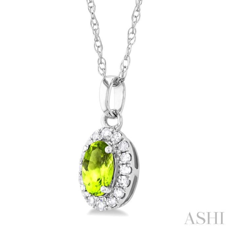 5x3 MM Oval Shape Peridot and 1/20 Ctw Round Cut Diamond Halo Semi-Precious Pendant with Chain in 14K White Gold