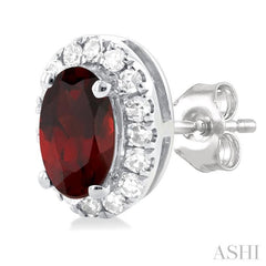 5x3 MM Oval Shape Garnet and 1/8 Ctw Single Cut Diamond Halo Semi-Precious Stud Earrings in 10K White Gold
