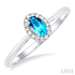 5x3 MM Oval Shape Blue Topaz and 1/20 Ctw Single Cut Diamond Halo Semi-Precious Ring in 10K White Gold