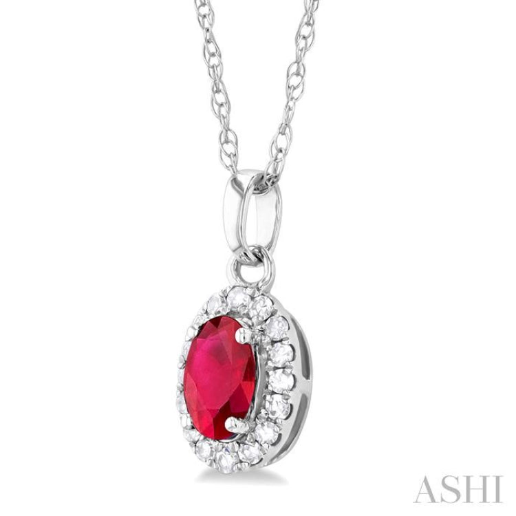 5x3 MM Oval Shape Ruby and 1/20 Ctw Round Cut Diamond Halo Precious Pendant with Chain in 10K White Gold