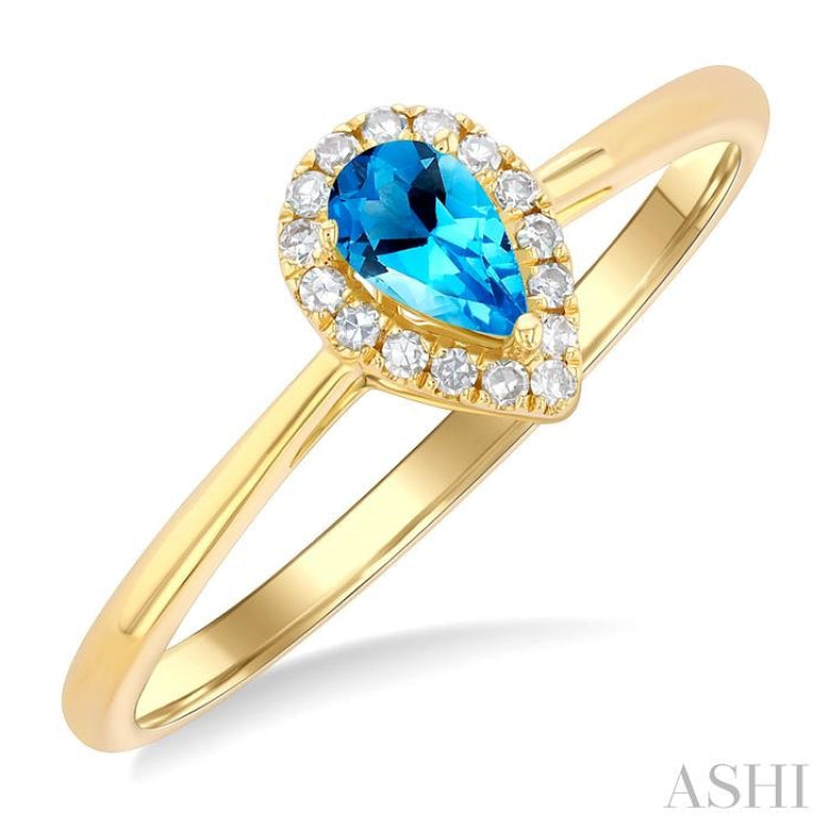 5x3 MM Pear Shape Blue Topaz and 1/20 Ctw Single Cut Diamond Halo Semi-Precious Ring in 10K Yellow Gold