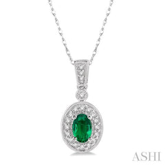 6x4 MM Oval Cut Emerald and 1/8 ctw Round Cut Diamond Pendant in 14K White Gold with Chain
