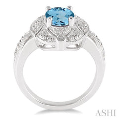9x7 MM Oval Cut Blue Topaz and 1/50 ctw Single Cut Diamond Ring in Sterling Silver