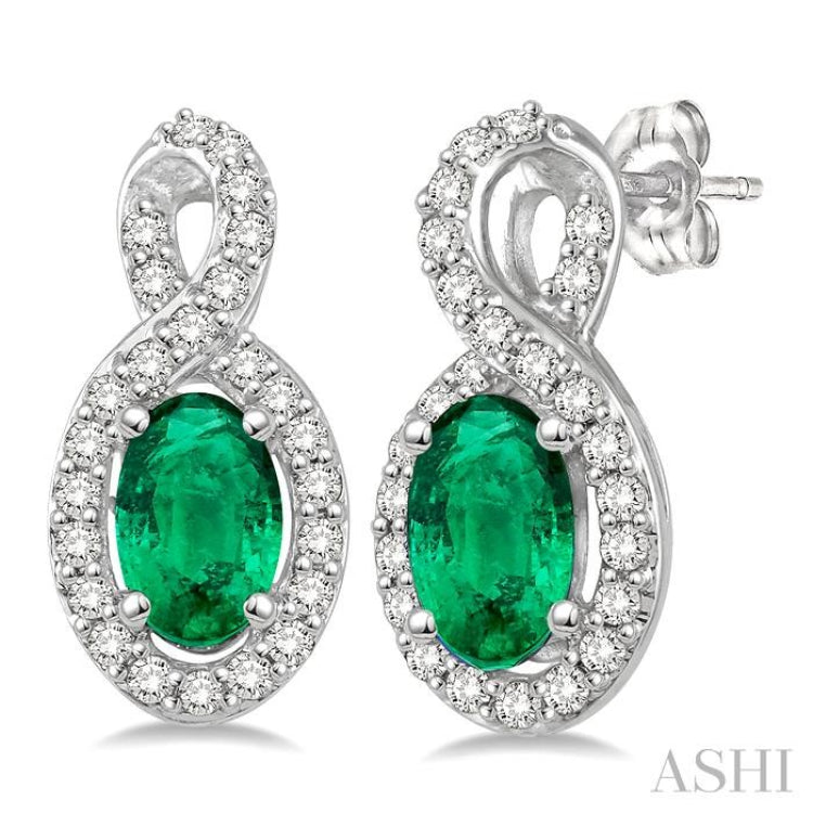5x3 MM Oval Cut Emerald and 1/5 ctw Round Cut Diamond Earrings in 10K White Gold