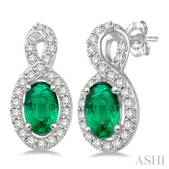 5x3 MM Oval Cut Emerald and 1/5 ctw Round Cut Diamond Earrings in 10K White Gold
