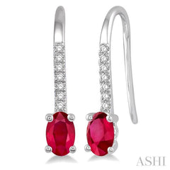 5x3 MM Oval Cut Ruby and 1/20 ctw Round Cut Diamond Precious Earrings in 10K White Gold