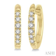 1/8 ctw Round Cut Diamond Huggie Petite Earrings in 10K Yellow Gold
