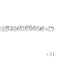 1/6 ctw Puffed Heart Plain and Round Cut Diamond Fashion Bracelet in Sterling Silver
