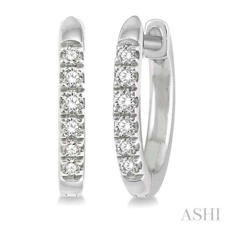 1/8 ctw Round Cut Diamond Huggie Petite Earrings in 14K White Gold