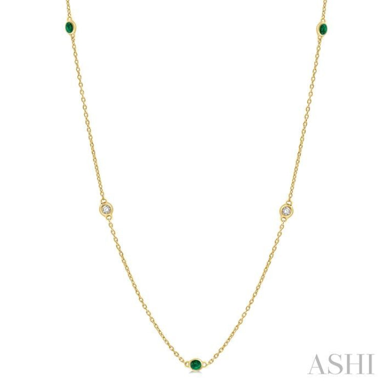 1.75 MM Emerald and 1/6 ctw Round Cut Diamond Precious Station Necklace in 14K Yellow Gold
