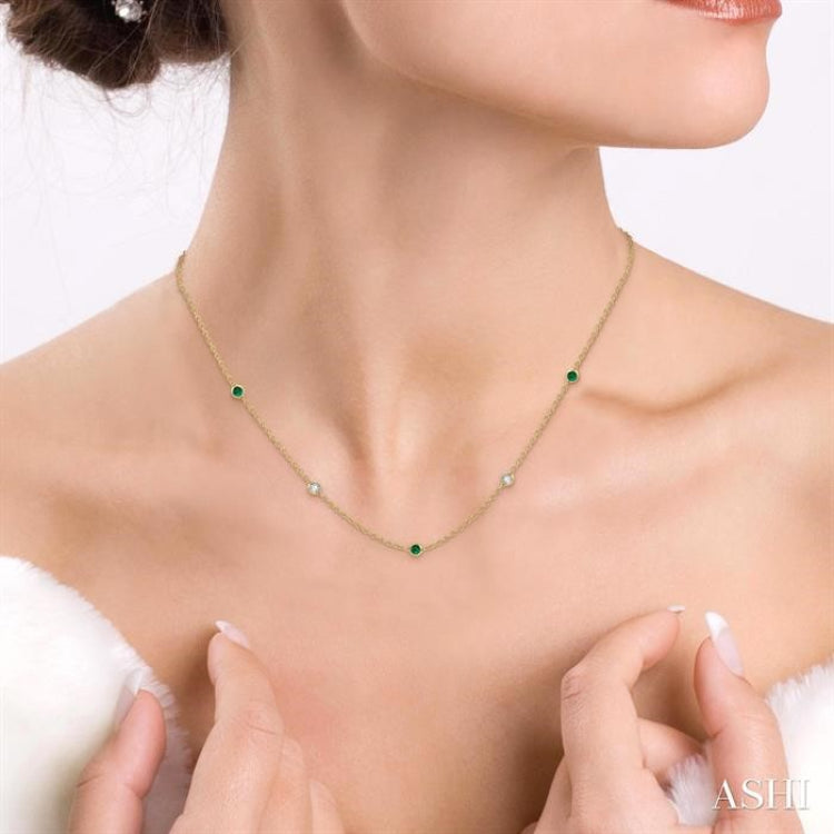 1.75 MM Emerald and 1/6 ctw Round Cut Diamond Precious Station Necklace in 14K Yellow Gold