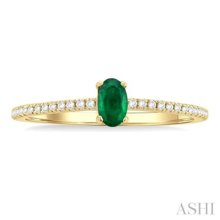5x3 MM Oval Cut Emerald and 1/10 ctw Petite Round Cut Diamond Precious Fashion Ring in 10K Yellow Gold