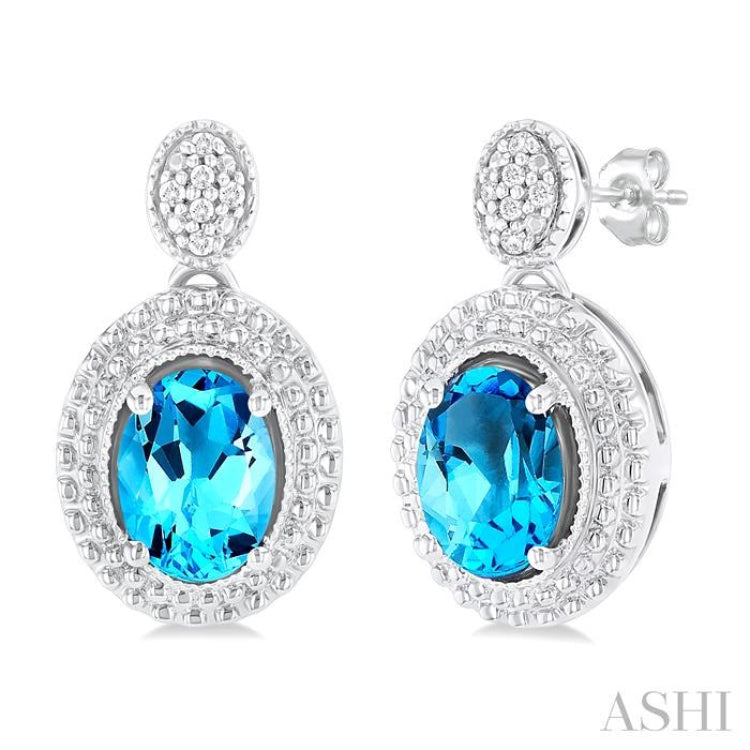 7X5 MM Oval Cut Blue Topaz and 1/20 ctw Round Cut Diamond Semi Precious Earring in Sterling Silver