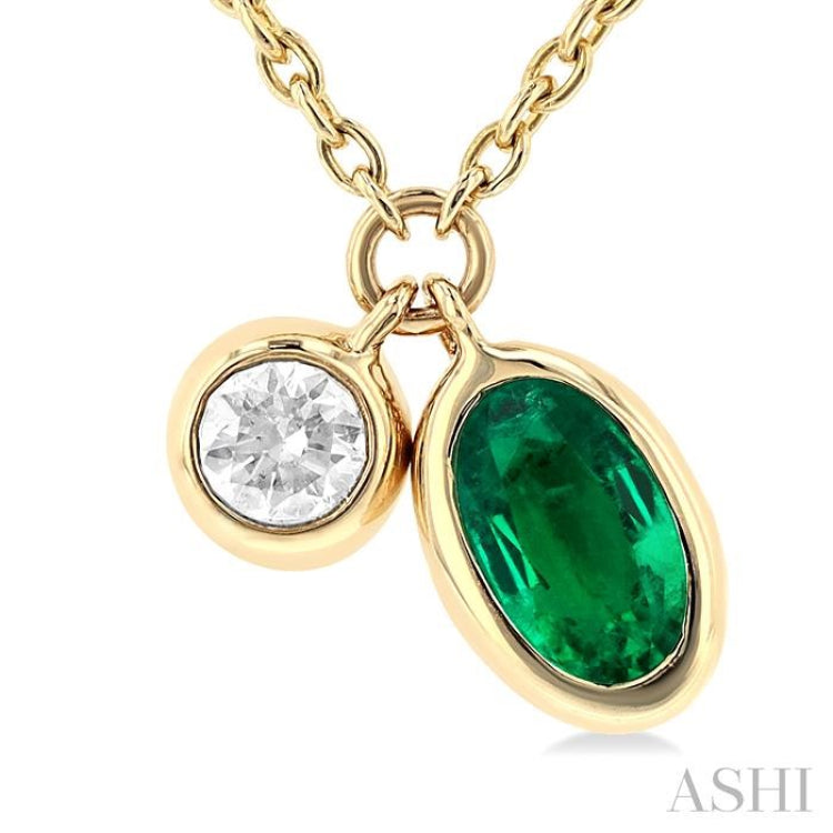 5x3 MM Oval Cut Emerald and 1/50 ctw Bezel Set Round Cut Diamond Precious Pendant With Chain in 10K Yellow Gold