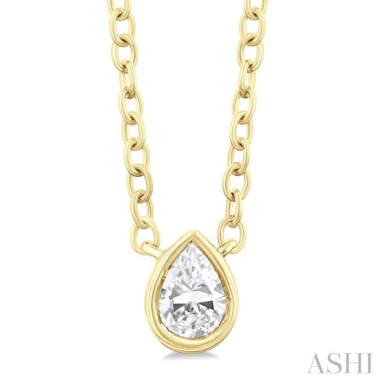 1/6 ctw Petite Bezel Set Pear Cut Diamond Fashion Pendant With Chain in 10K Yellow Gold
