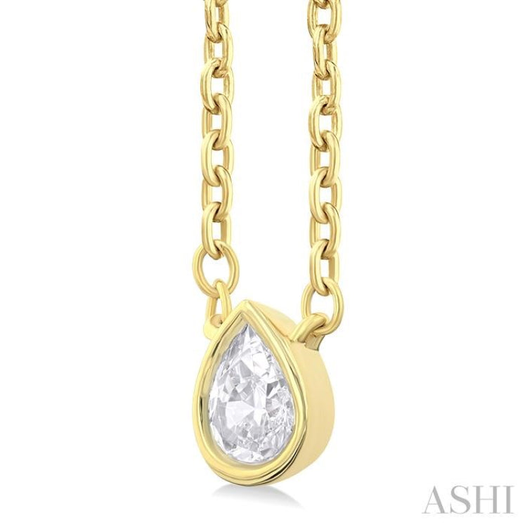 1/6 ctw Petite Bezel Set Pear Cut Diamond Fashion Pendant With Chain in 10K Yellow Gold
