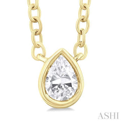 1/6 ctw Petite Bezel Set Pear Cut Diamond Fashion Pendant With Chain in 10K Yellow Gold