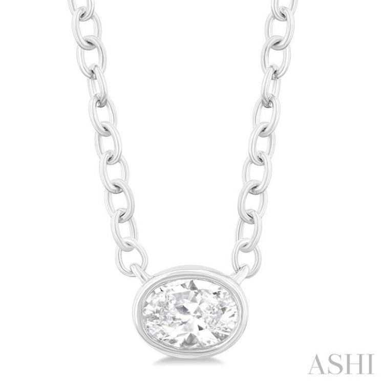 1/6 ctw Petite East-West Bezel Set Oval Cut Diamond Fashion Pendant With Chain in 10K White Gold