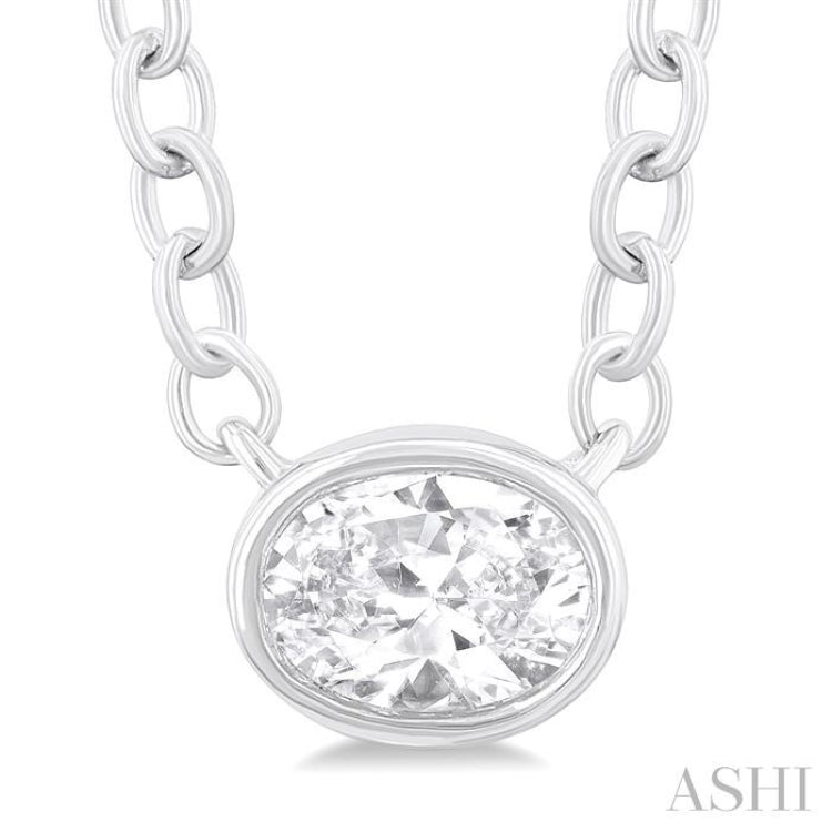 1/6 ctw Petite East-West Bezel Set Oval Cut Diamond Fashion Pendant With Chain in 10K White Gold